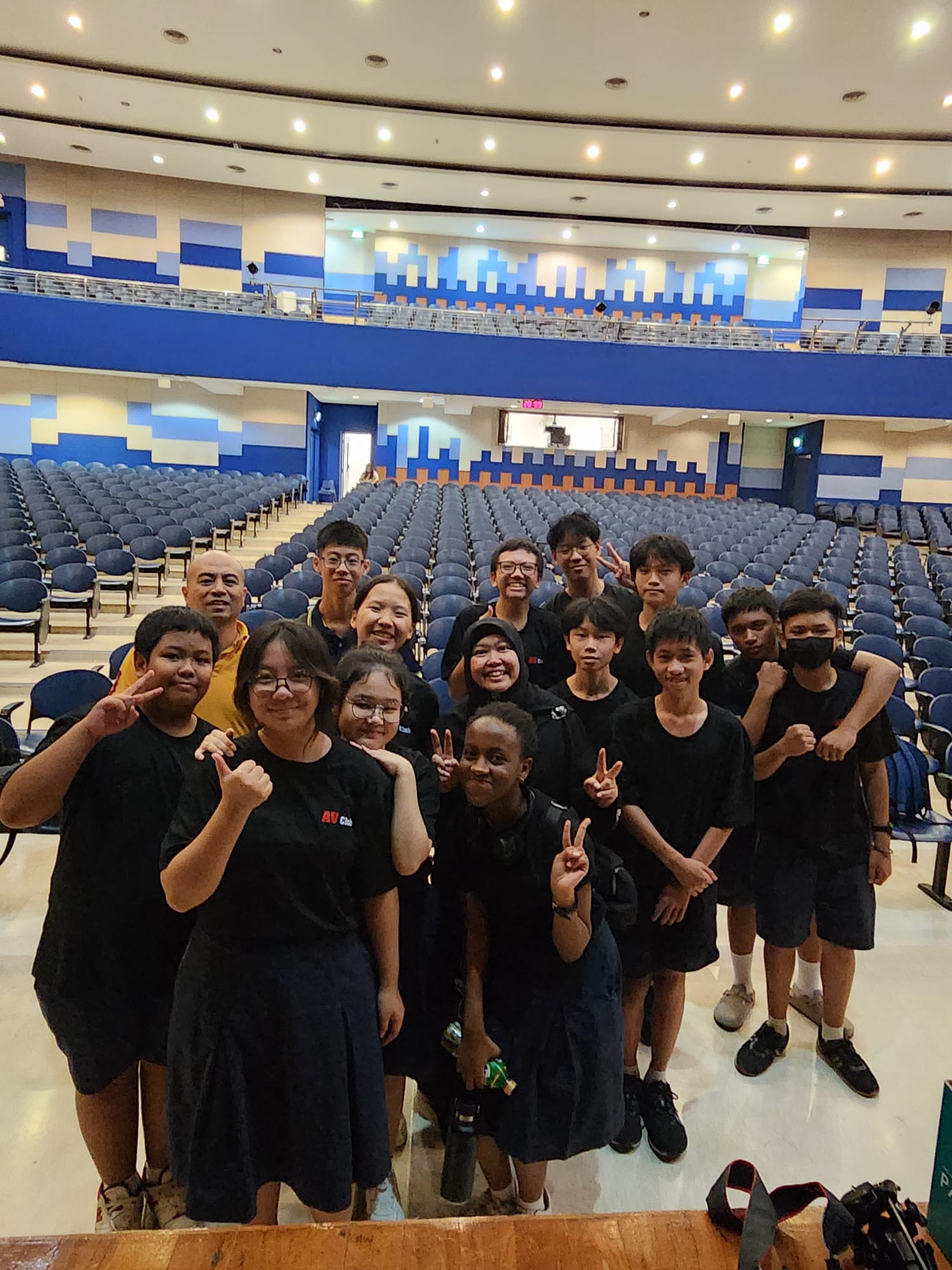 Audio Visual Club group photo in the school auditorium